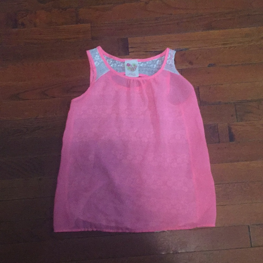 A pink and withe blouse